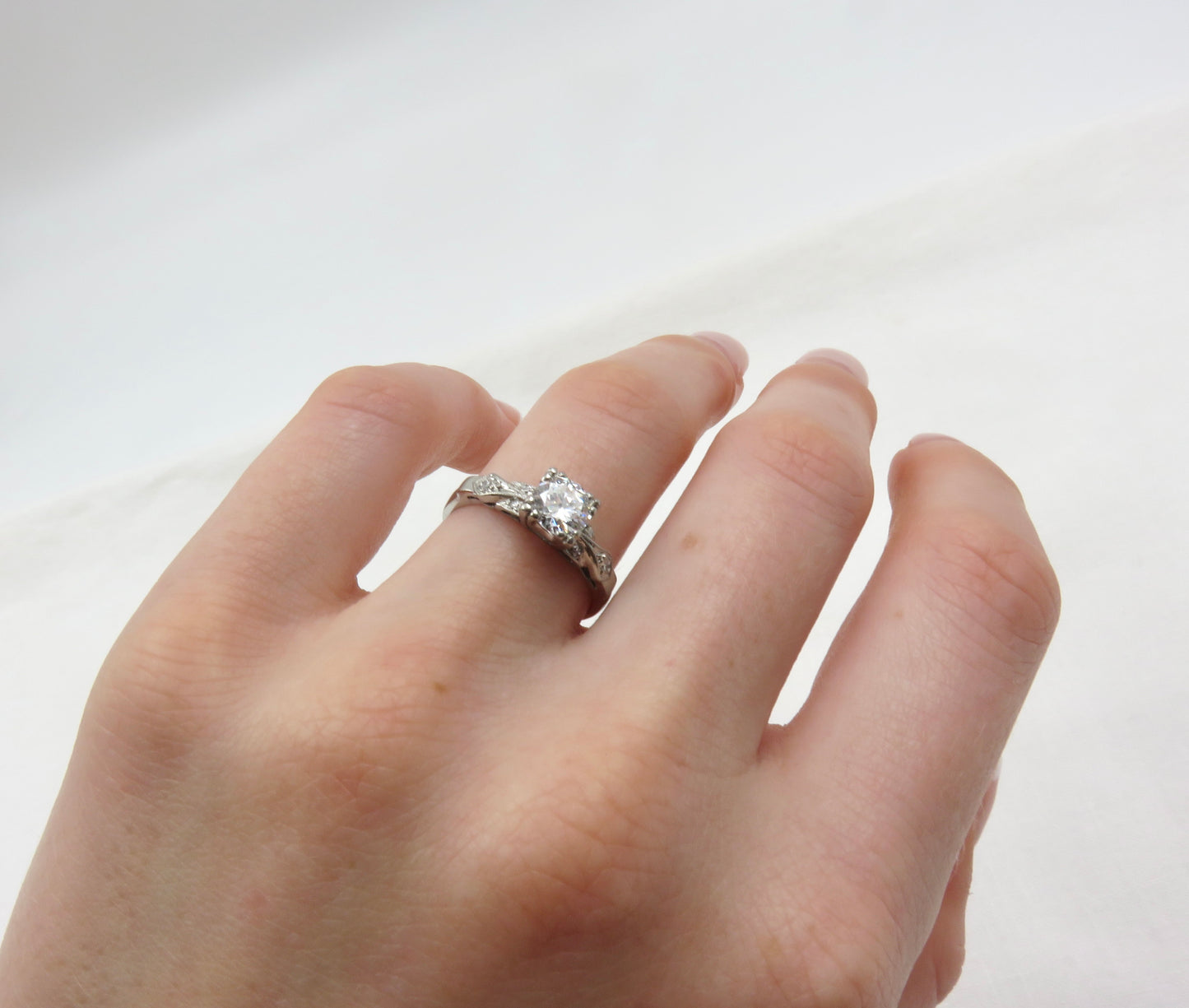 Circa 1930's, Platinum Ring Featuring a 0.56 ctw Round Brilliant Cut Diamond, VS1, Color E