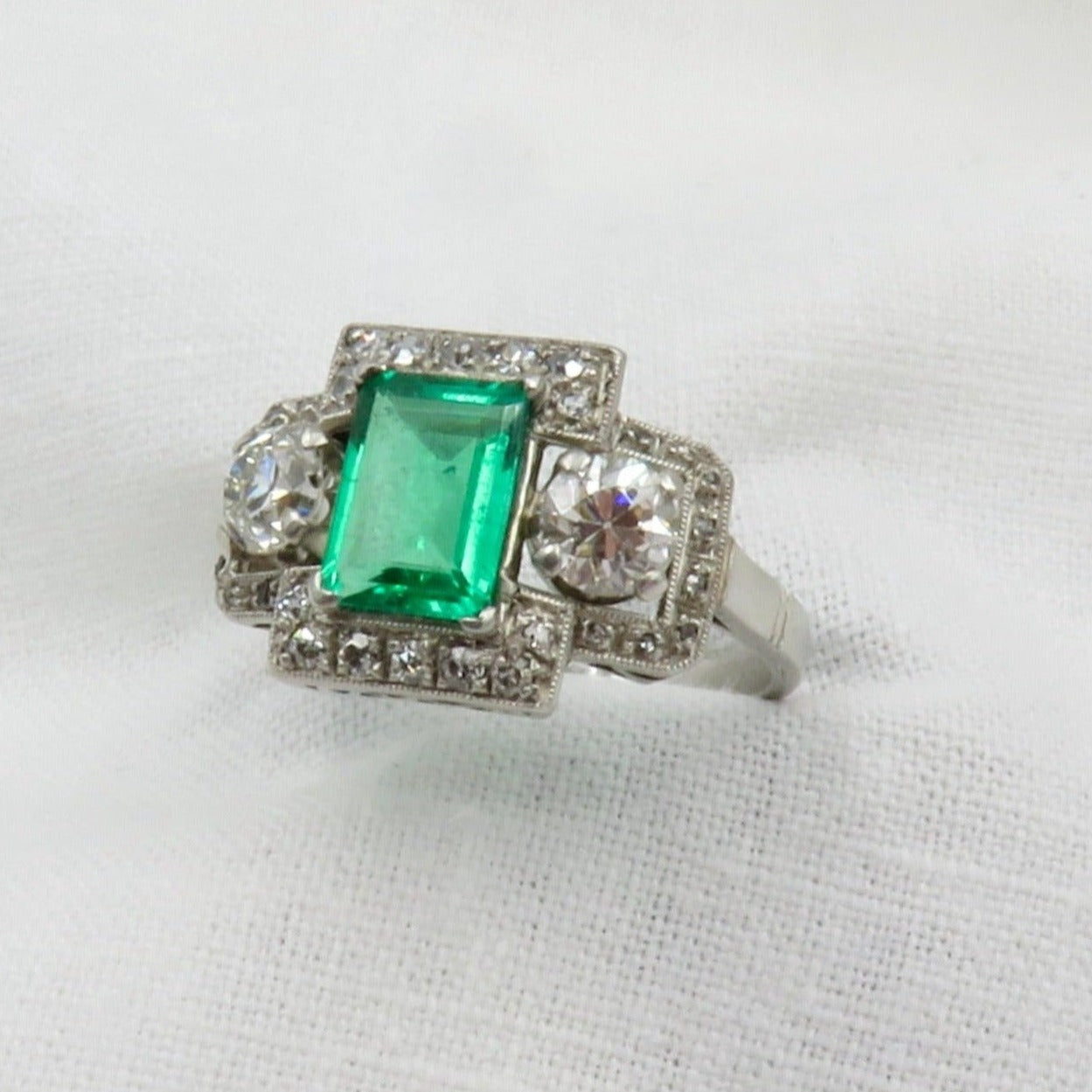 Circa 1920. Emerald and Diamond Ring