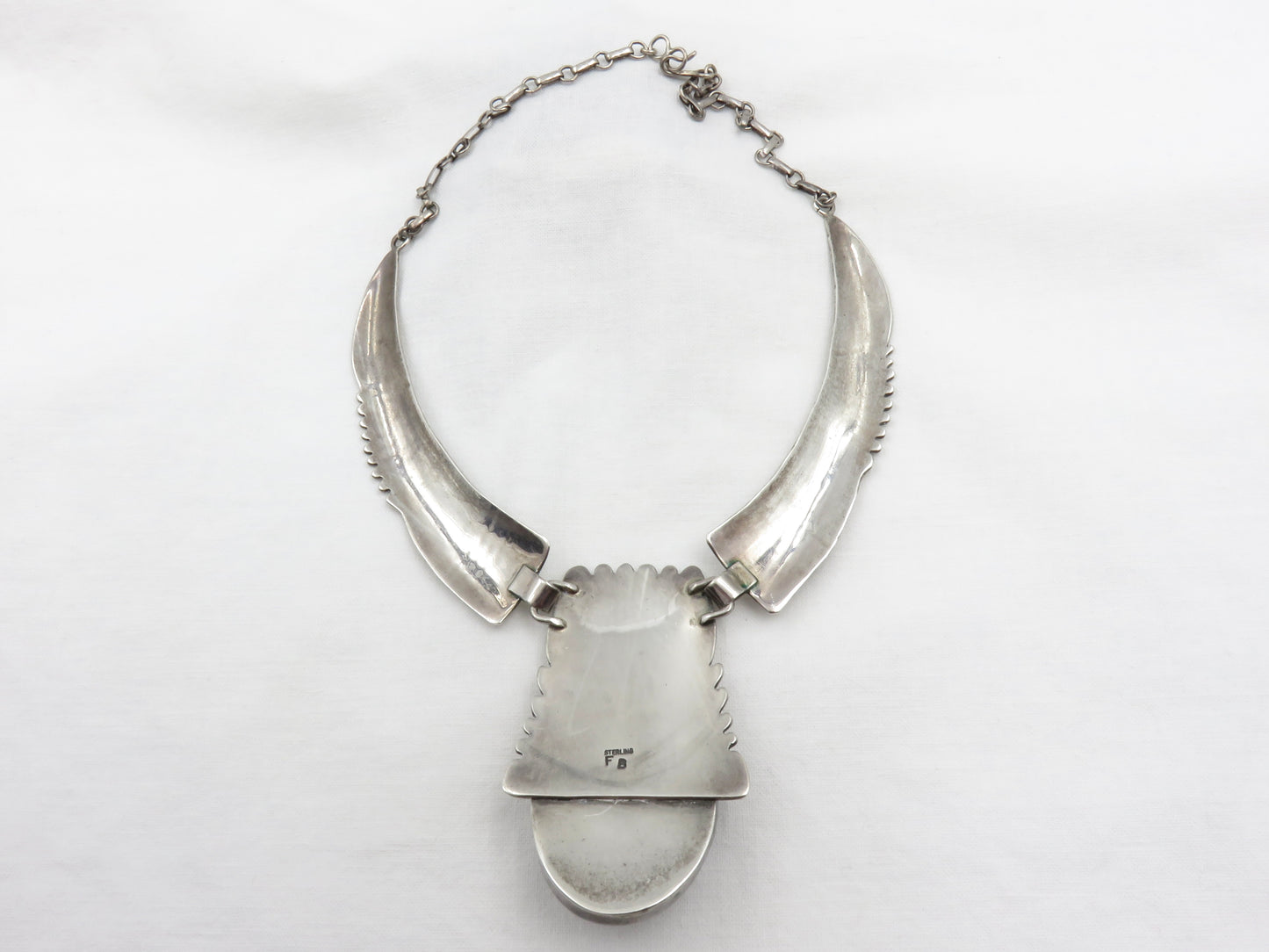 Circa 1940. Fred Baca Native American Silversmith Sterling Necklace with Acoma Jet