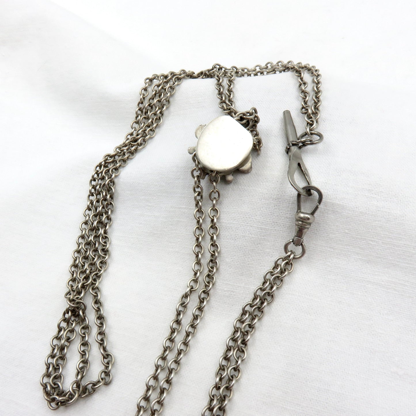 Circa 1890. Victorian Silver and Amethyst Watch Chain/Slide Chain