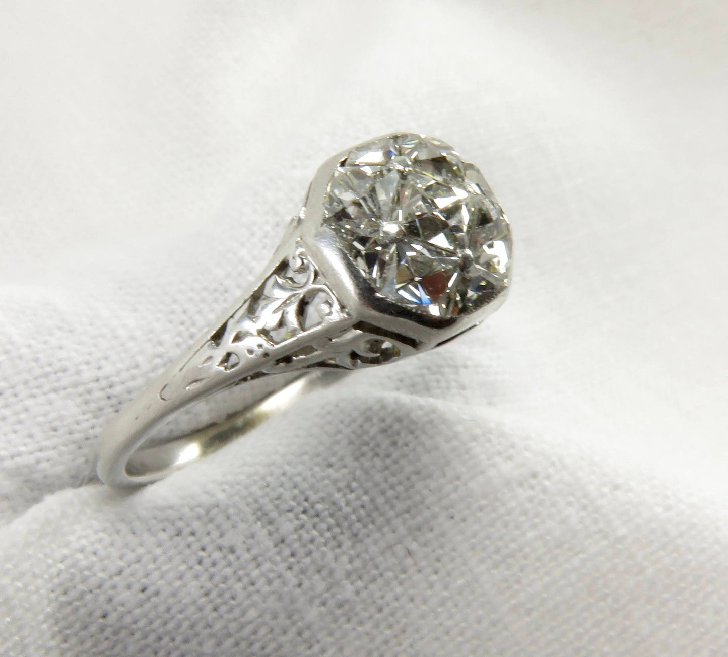 Circa 1915 Edwardian Platinum Engagement Ring with French Cut Diamonds, VS2 Clarity.