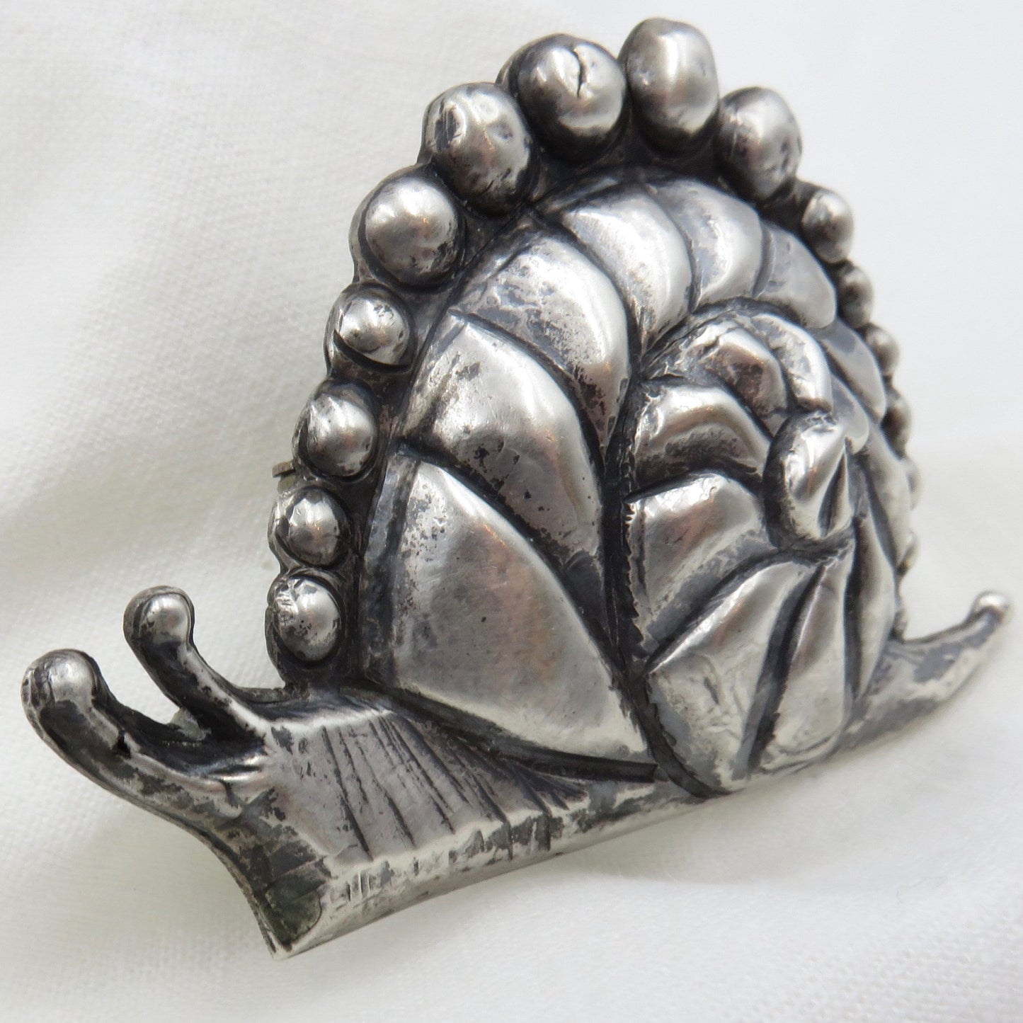 Circa 1940. Made in Mexico Casa Prieto Silver Snail Brooch