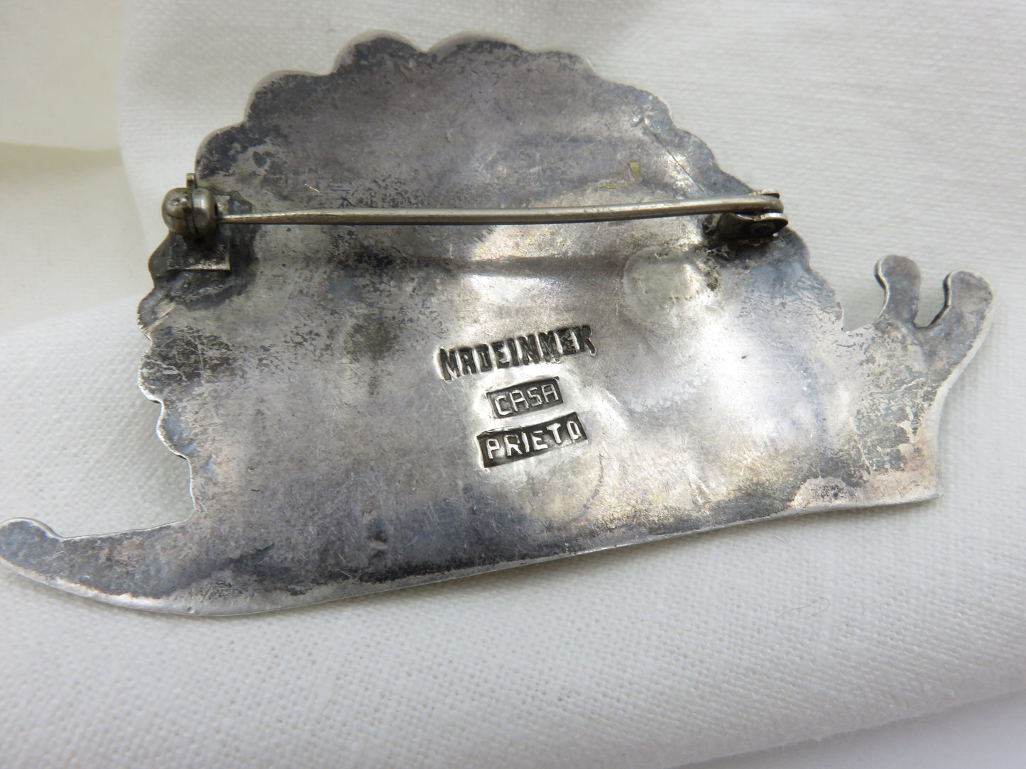 Circa 1940. Made in Mexico Casa Prieto Silver Snail Brooch