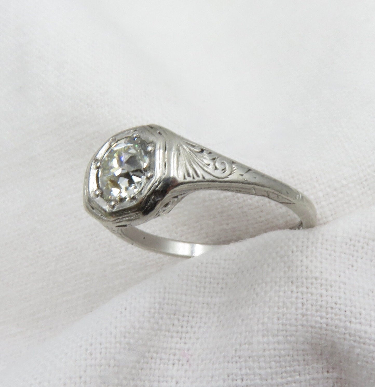Circa 1920's Platinum Engagement Ring set with 0.83 CT VS1 Old European Cut Diamond
