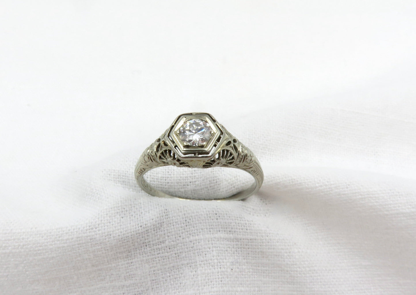 Circa 1930 18kt White Gold and Filigree 0.33 Carat VS2, G color Diamond Engagement  Ring.