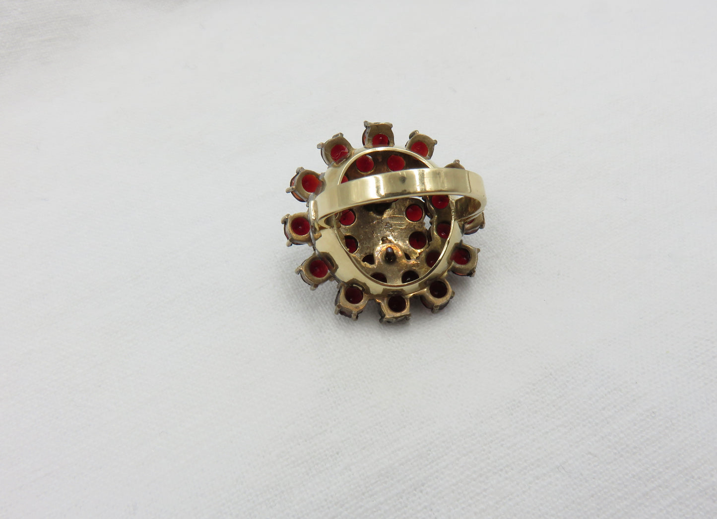 Circa 1930 Garnet Cluster ring set in 14 karat gold