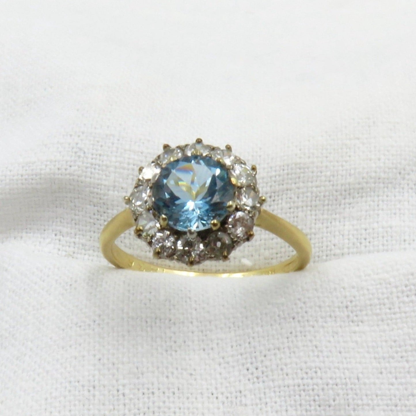 Circa 1950's  1.00 carat  Brilliant Cut  Aquamarine and Diamond Ring Set in Platinum and 18karat Gold