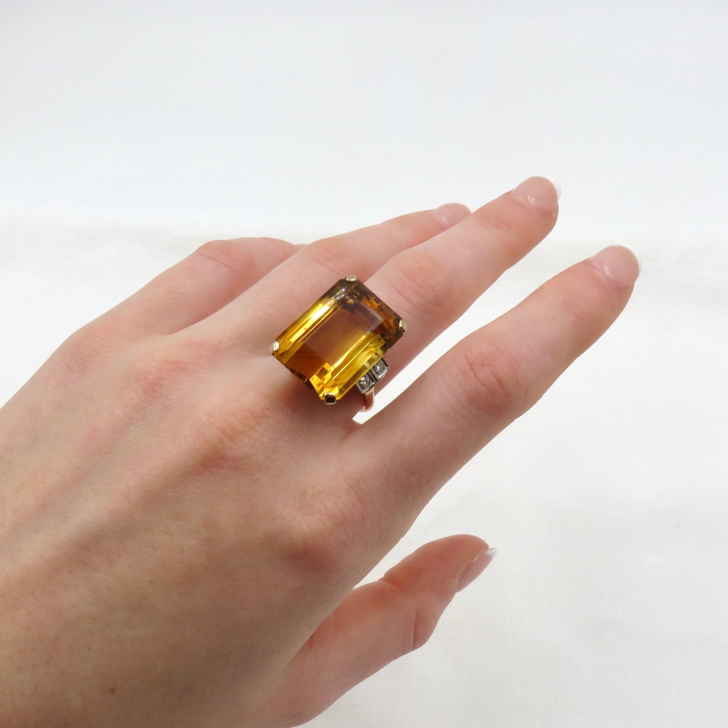 Circa 1940 Retro Era Ring; 22 carat Emerald Cut Natural Citrine Set In 14kt Gold