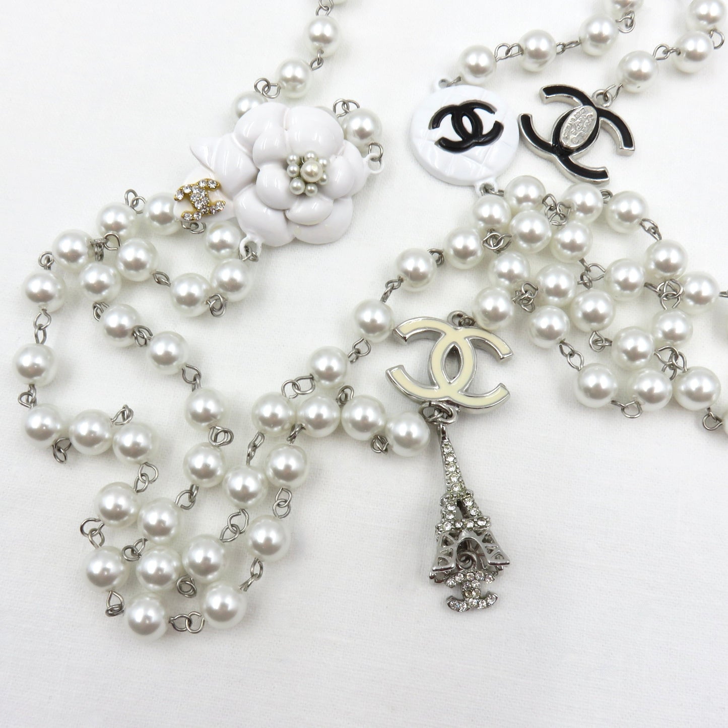 Vintage Chanel Faux Pearl Necklace Featuring Enamel CC logos, Camellia and Eiffel Tower