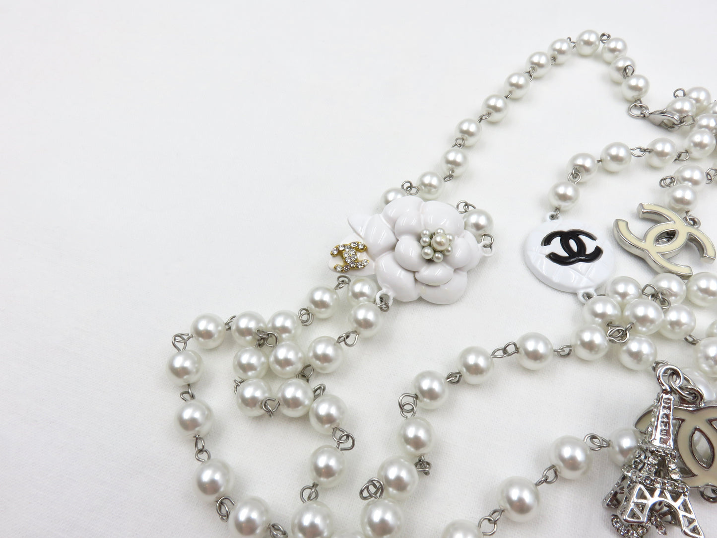 Vintage Chanel Faux Pearl Necklace Featuring Enamel CC logos, Camellia and Eiffel Tower