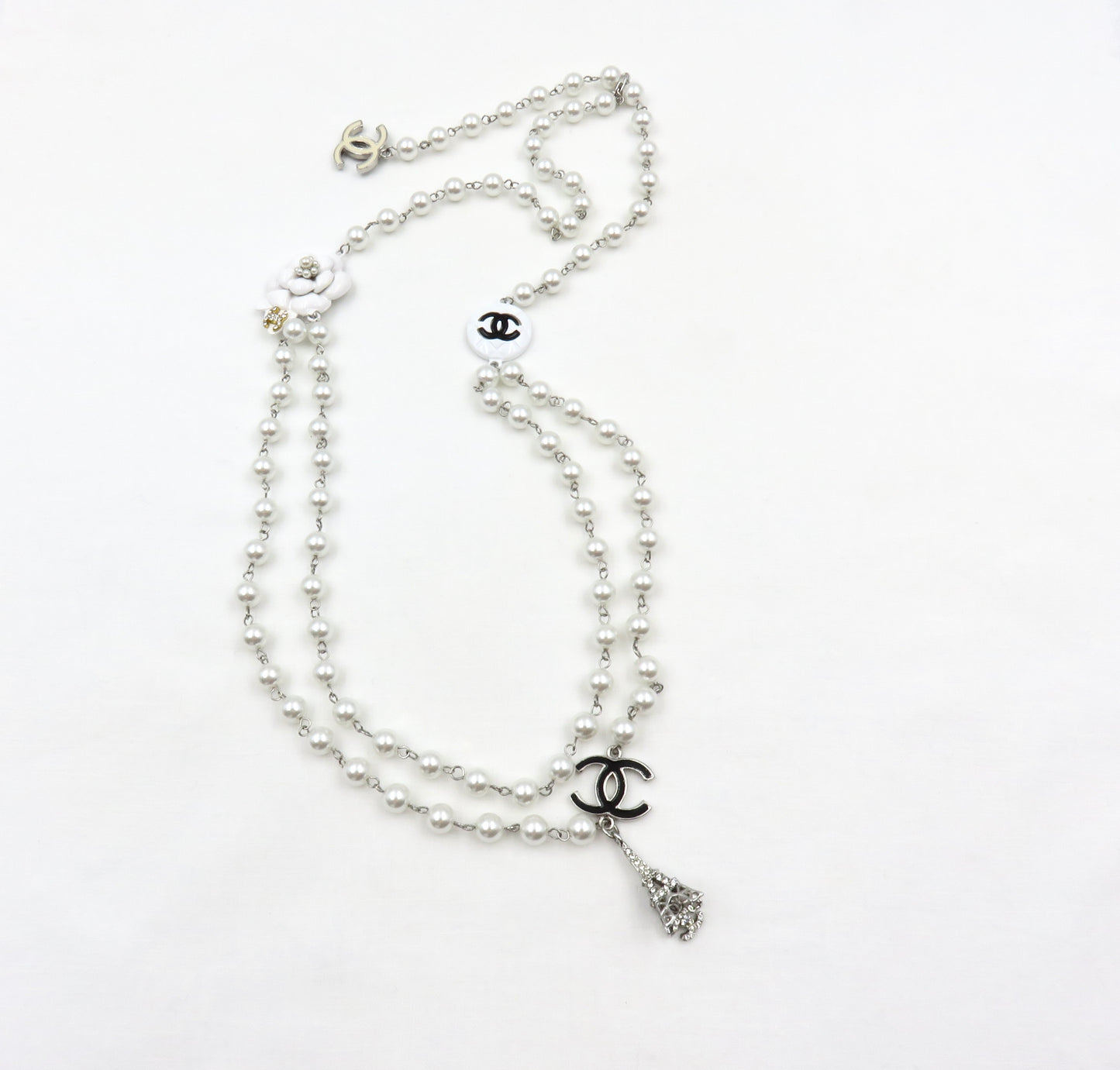 Vintage Chanel Faux Pearl Necklace Featuring Enamel CC logos, Camellia and Eiffel Tower