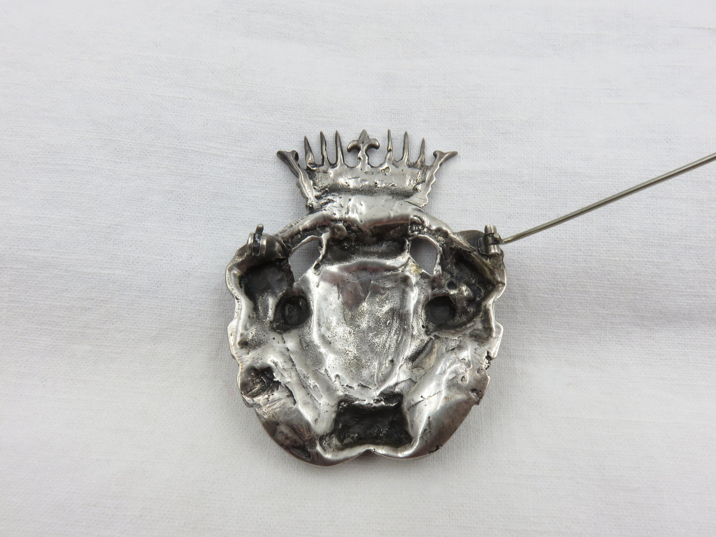 Circa Late 19th Century Silver and Coral Shield and Crown Brooch