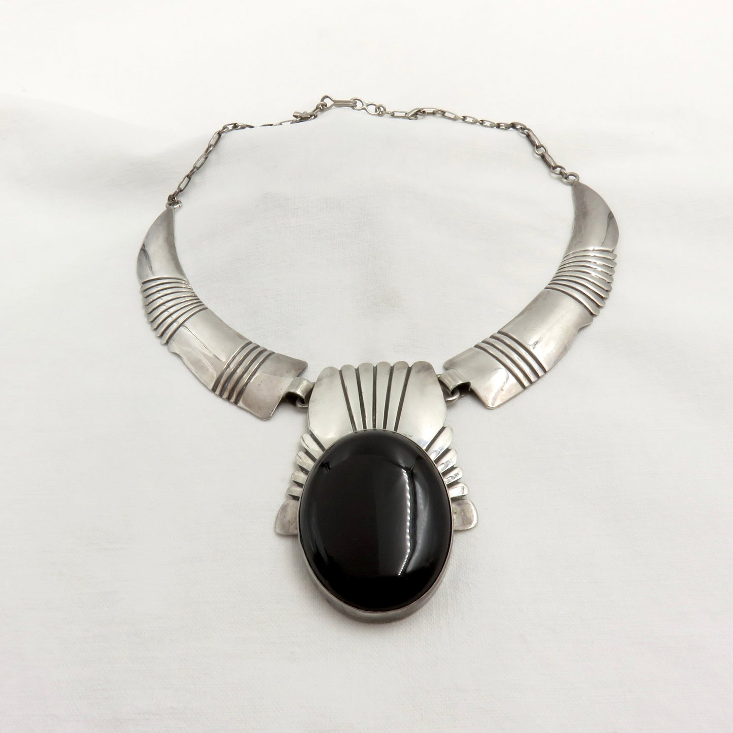 Circa 1940. Fred Baca Native American Silversmith Sterling Necklace with Acoma Jet