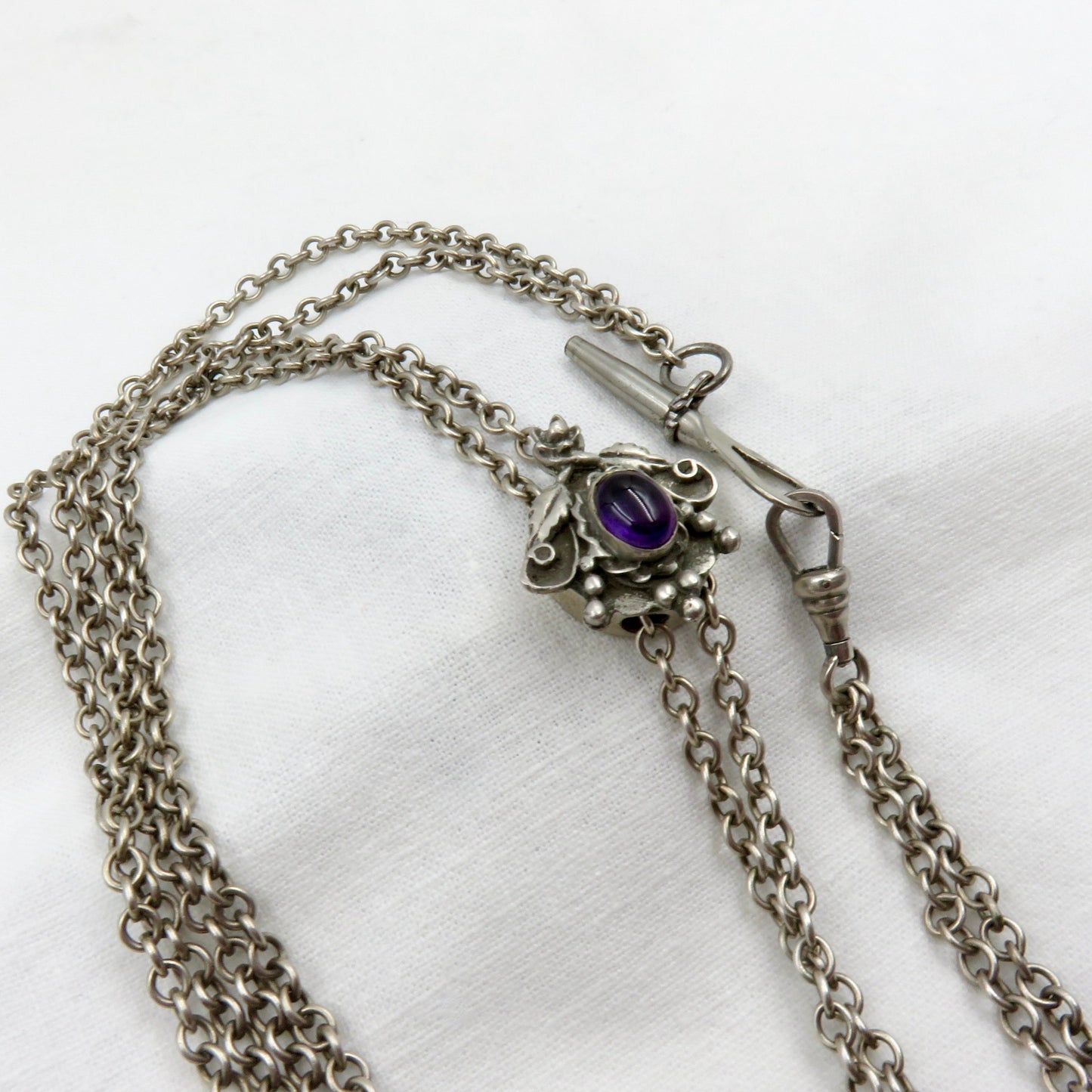 Circa 1890.  Victorian Silver and Amethyst Watch Chain/Slide Chain