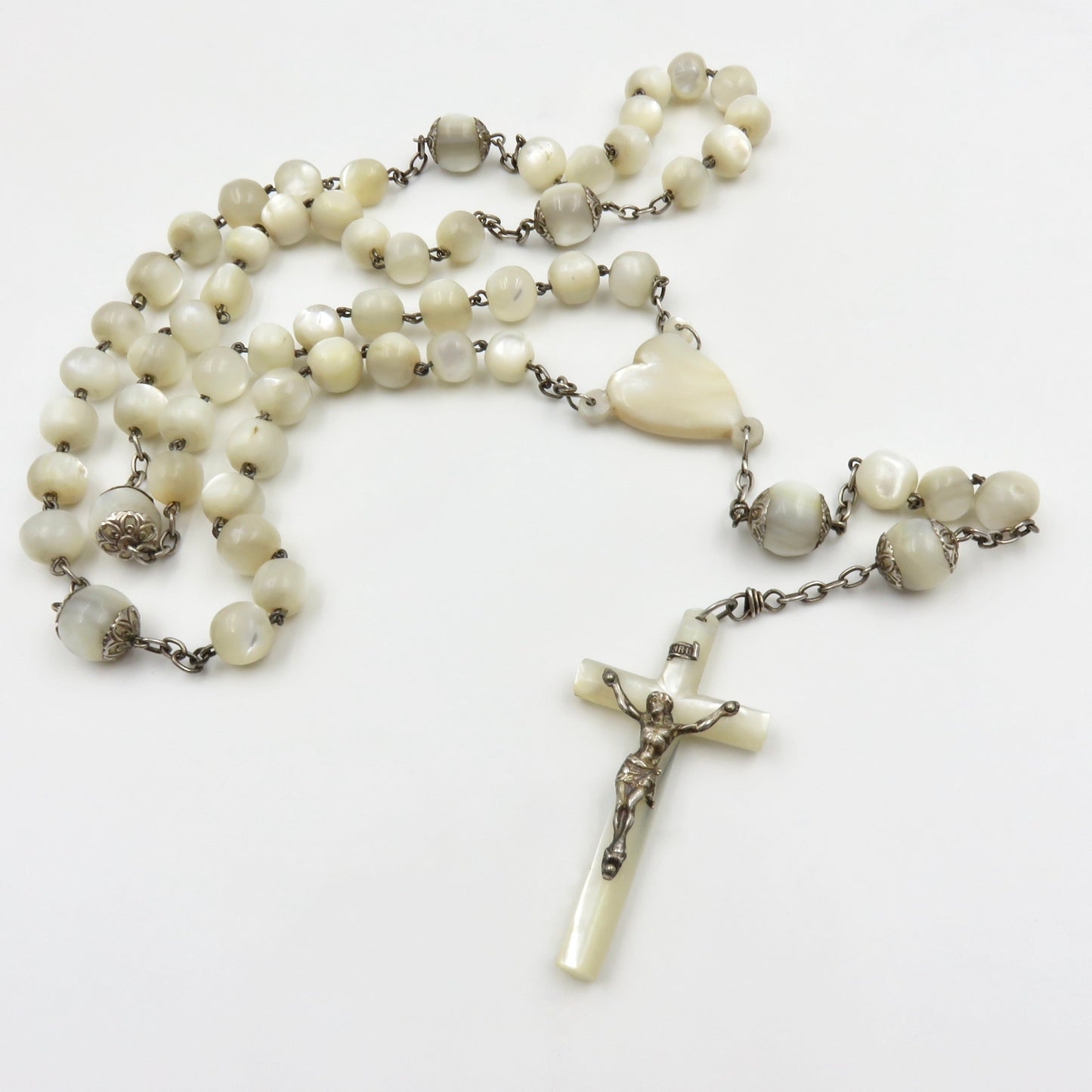 Circa 1890. Mother of Pearl and Silver Rosary