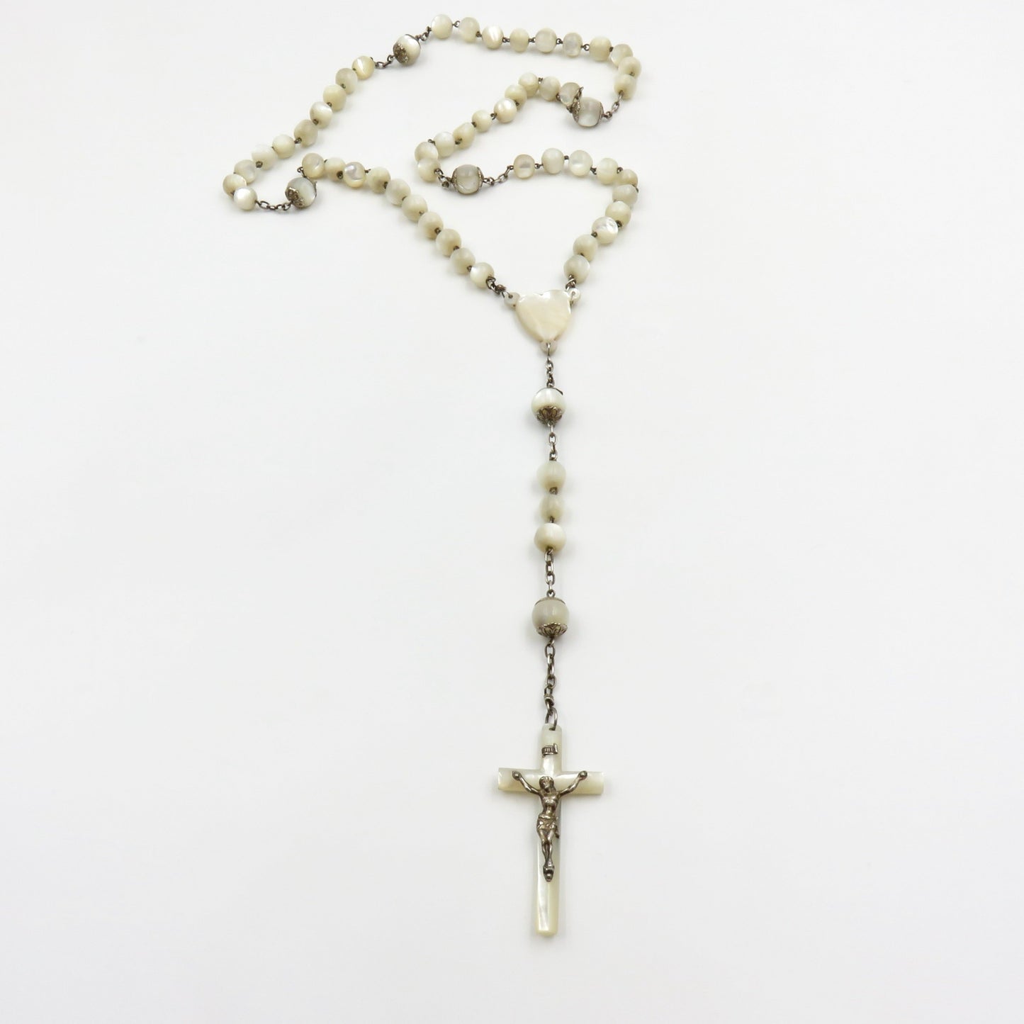 Circa 1890. Mother of Pearl and Silver Rosary