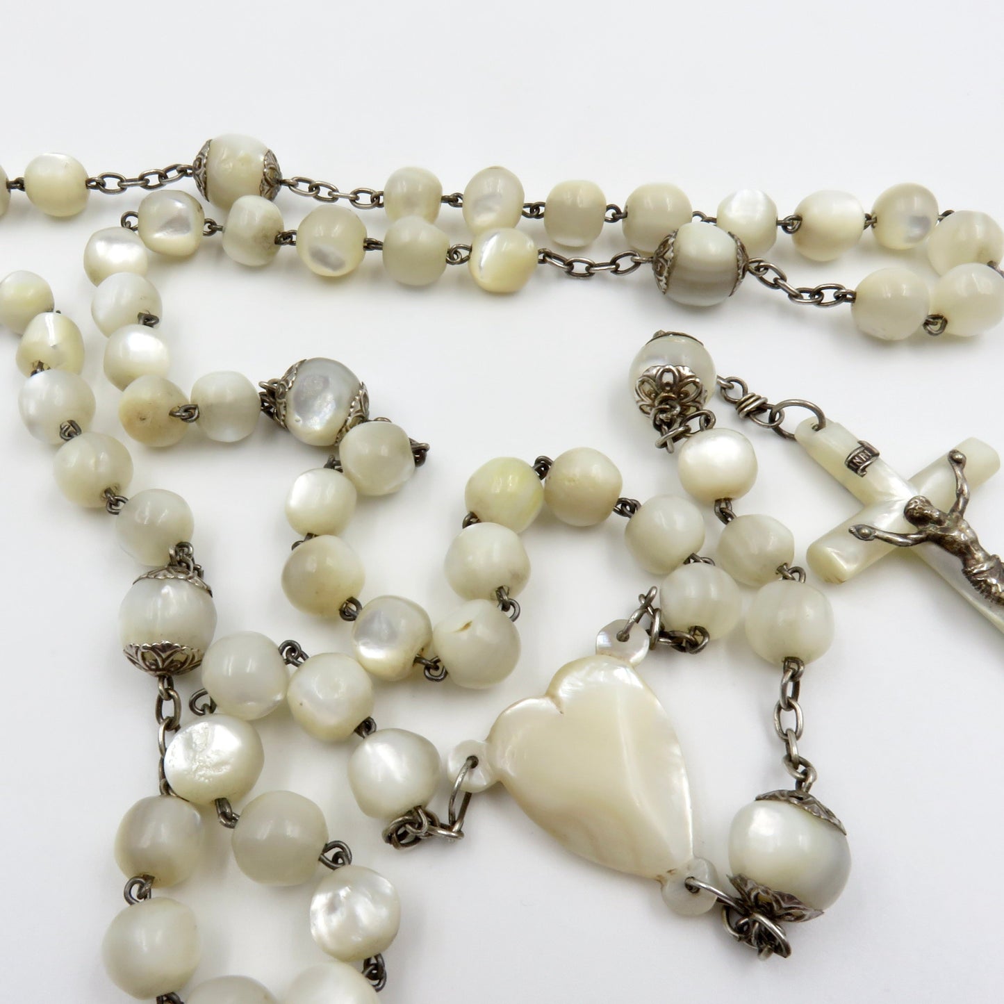 Circa 1890. Mother of Pearl and Silver Rosary