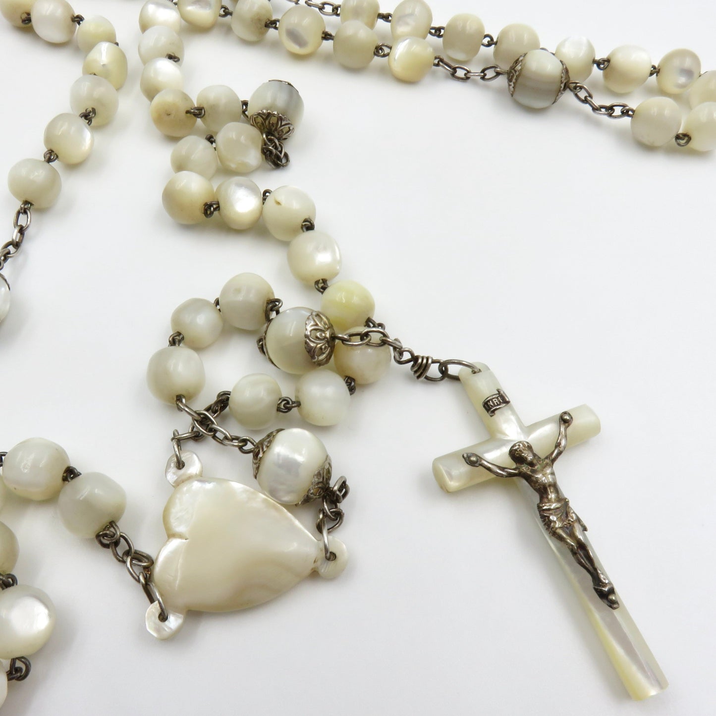 Circa 1890. Mother of Pearl and Silver Rosary