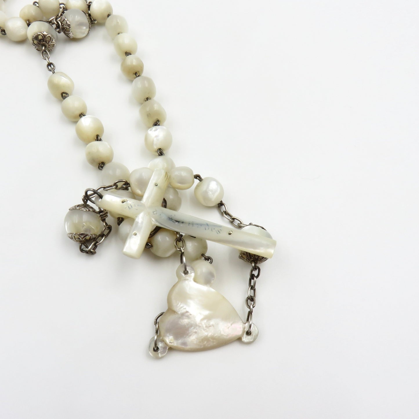 Circa 1890. Mother of Pearl and Silver Rosary