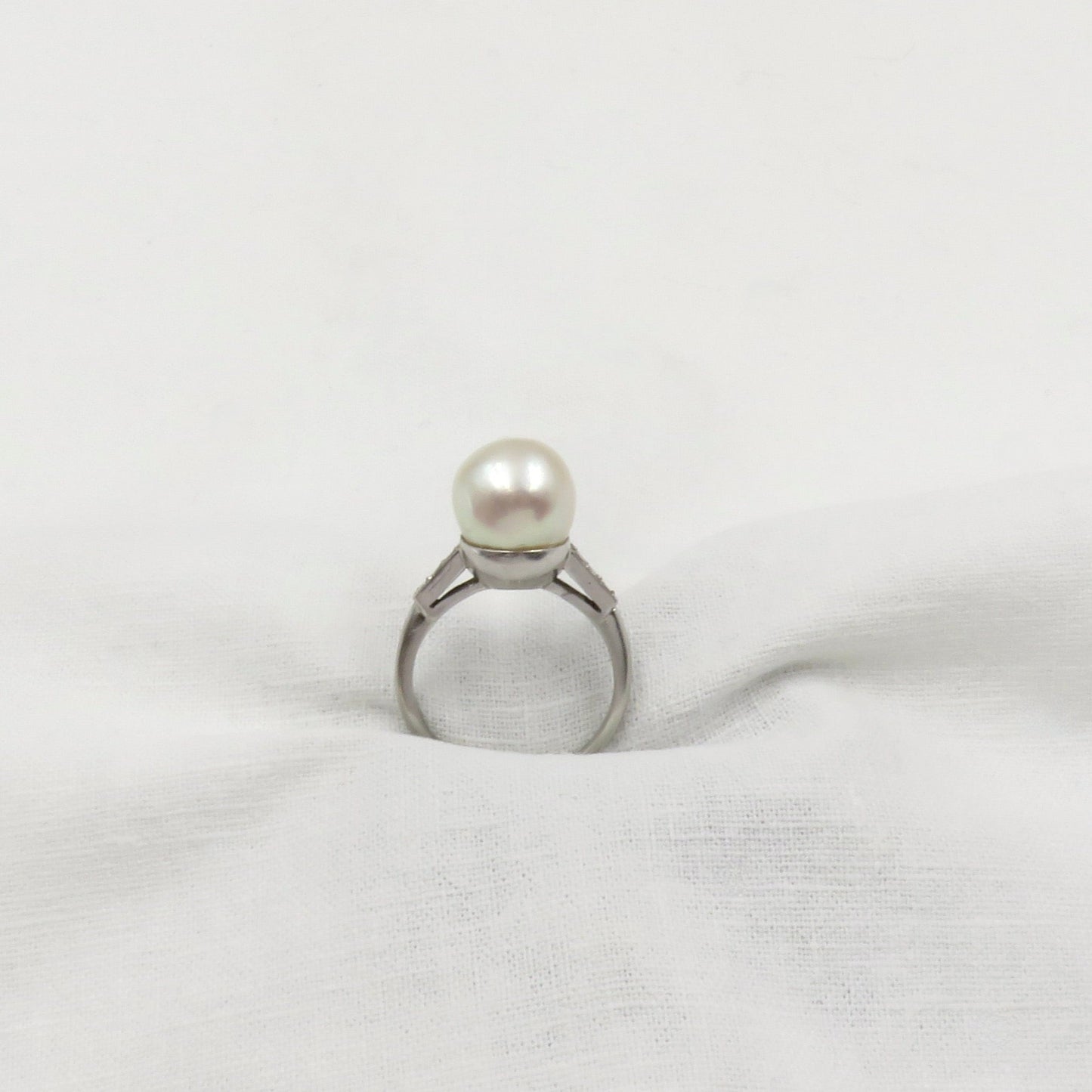 Circa 1950 Platinum ring with Cultured Pearl and Diamonds