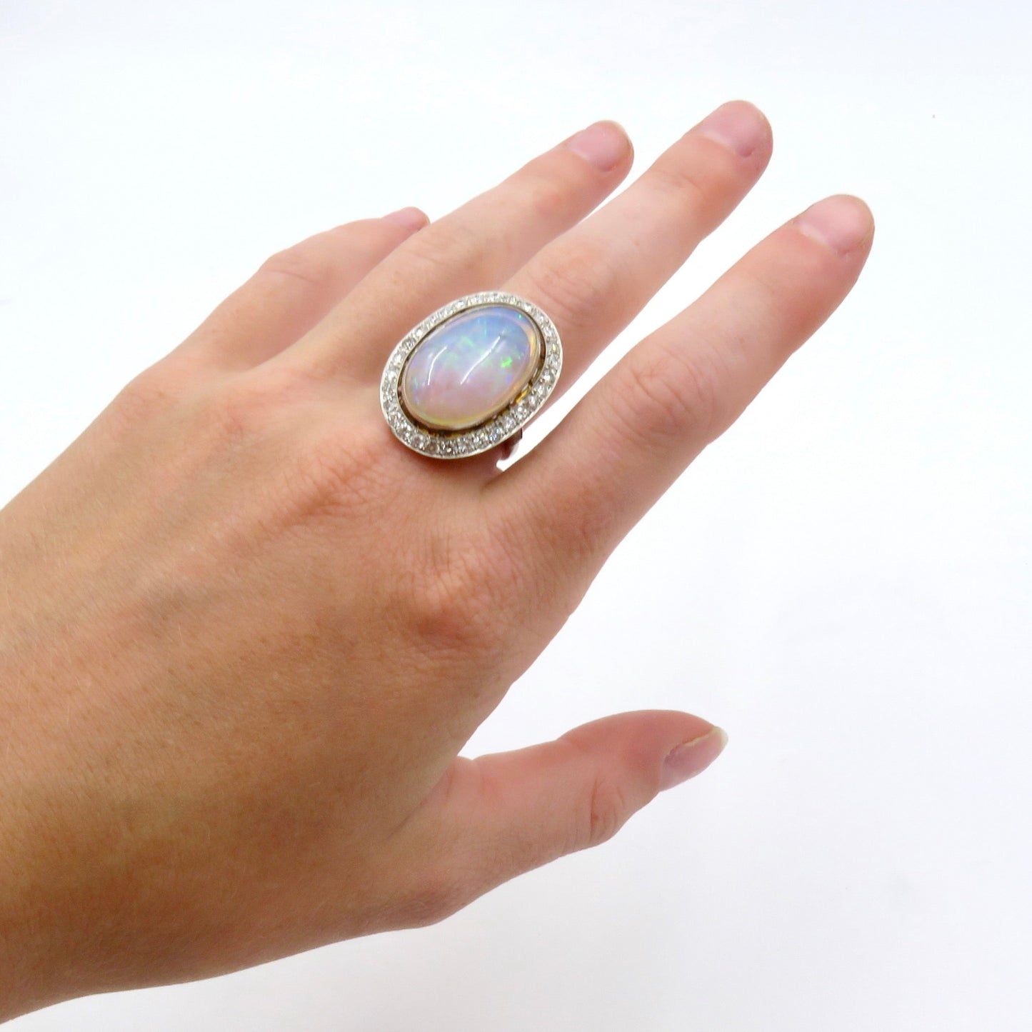 Mid Century Era 8.83 - Carat Oval Cabochon Cut Natural Crystal Opal And Diamond Ring