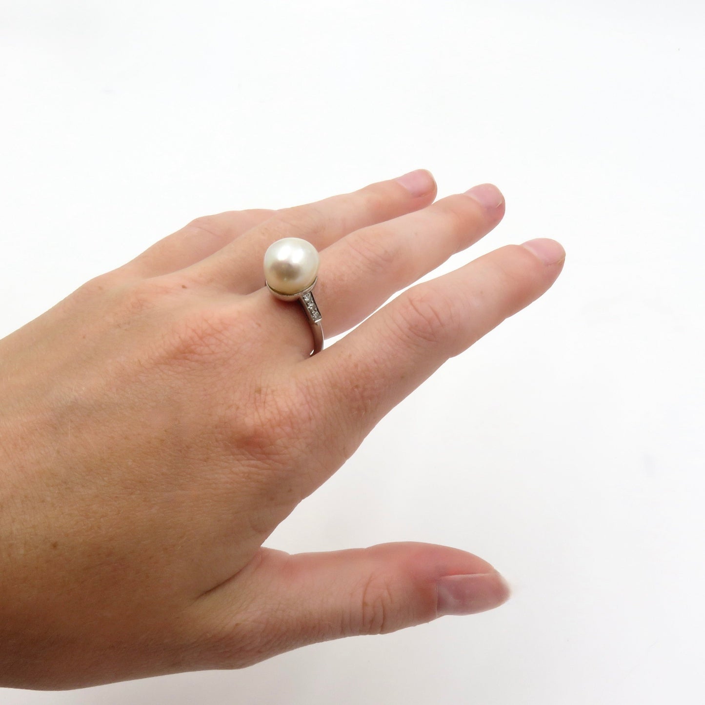 Circa 1950 Platinum ring with Cultured Pearl and Diamonds