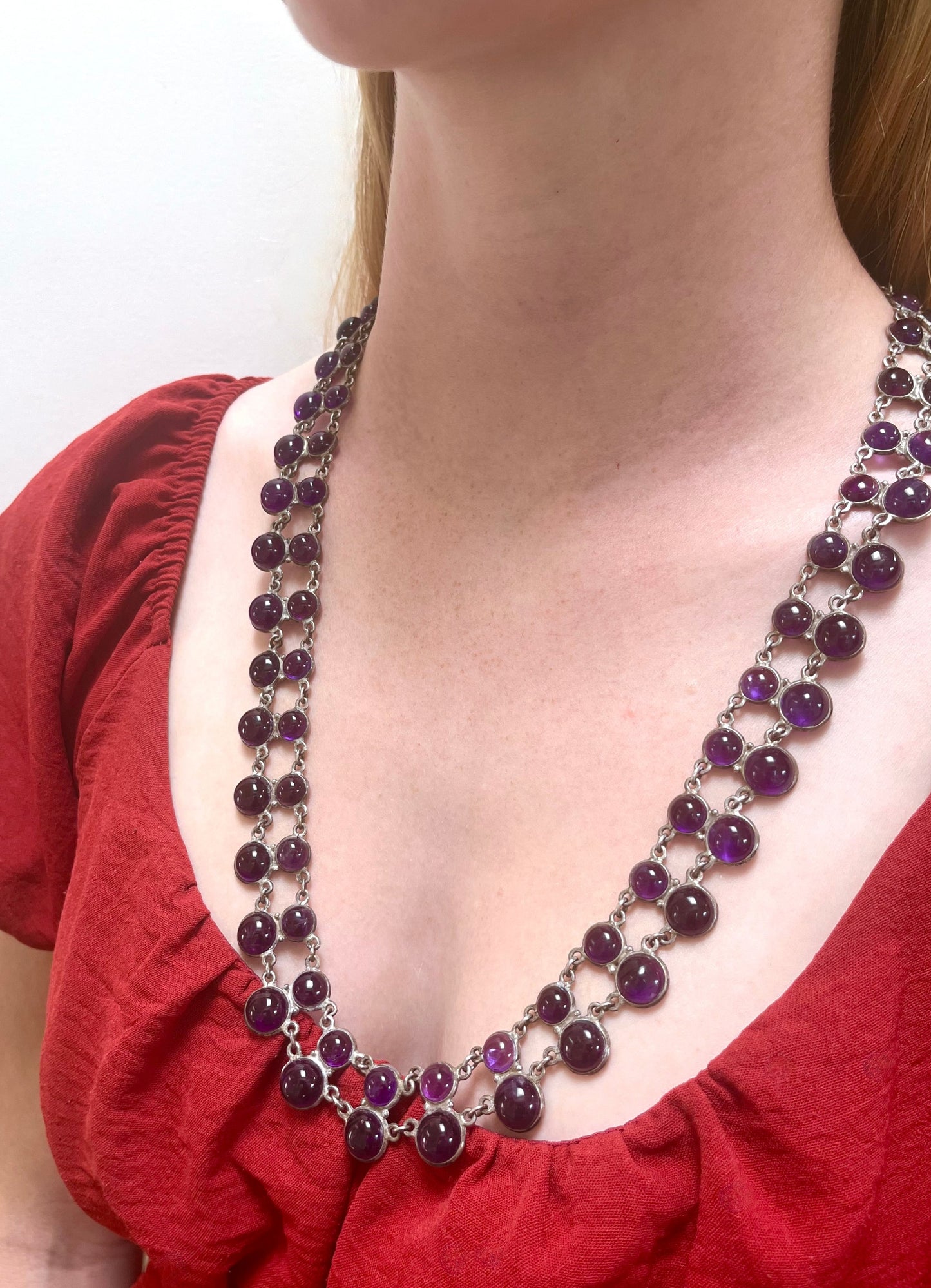 Circa 1940. Double Strand Bezel Set Cabochon Amethyst Necklace