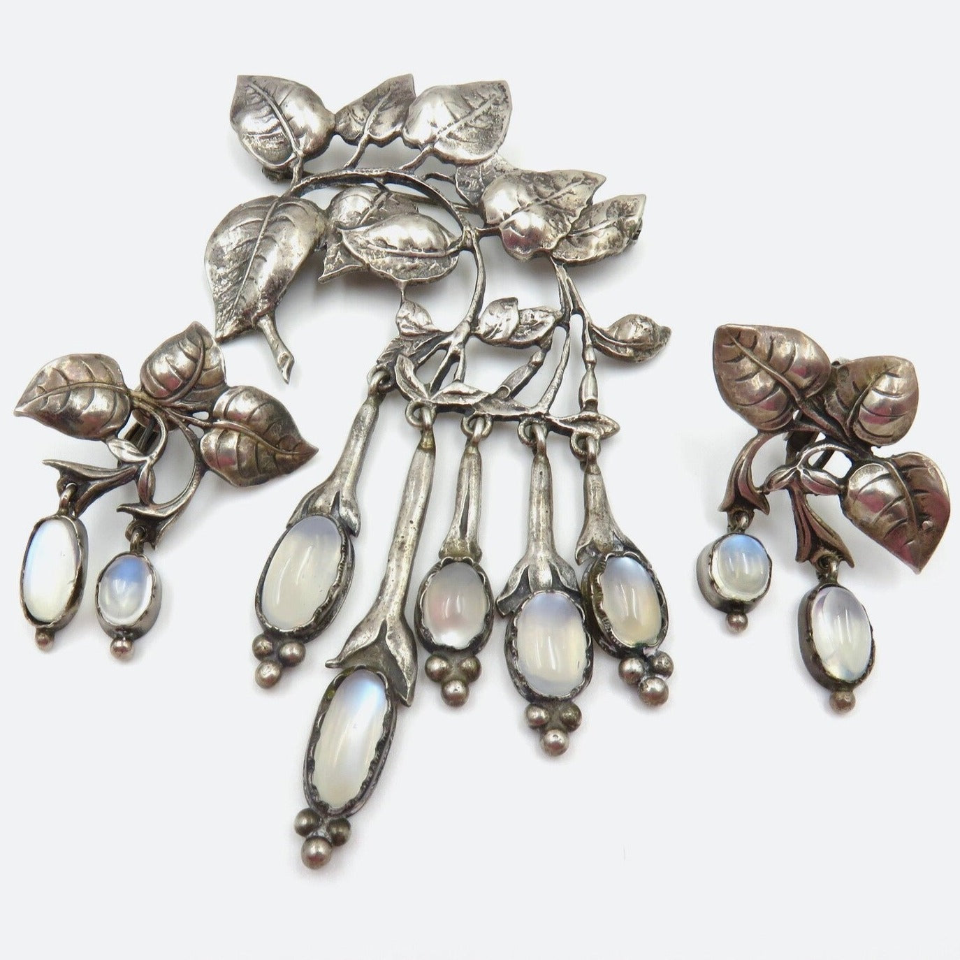 Circa 1940. Silver and Moonstone Brooch and Earring set by Cini