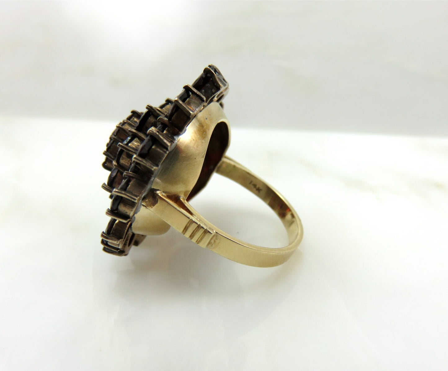 Circa 1930 Garnet Cluster ring set in 14 karat gold