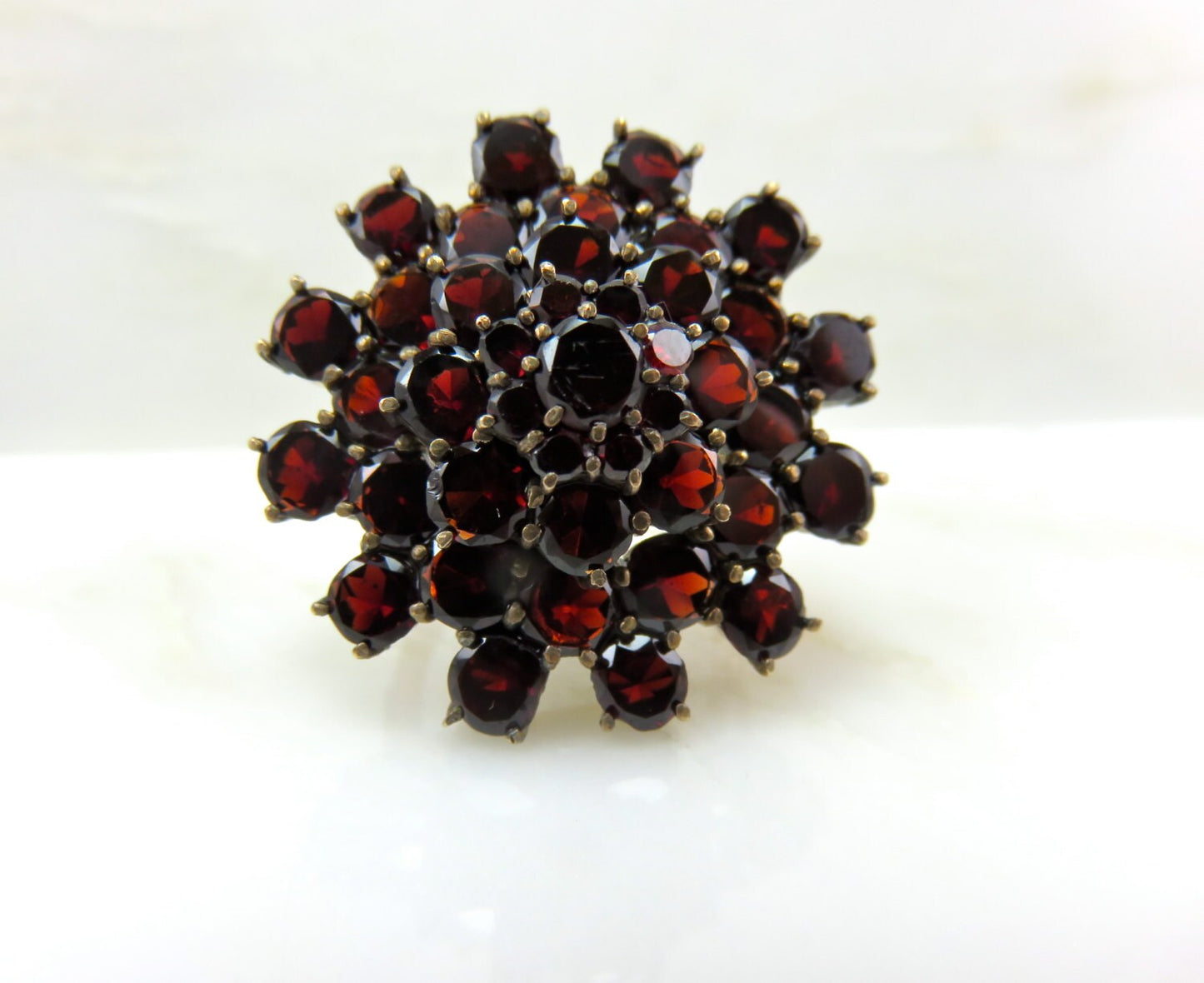 Circa 1930 Garnet Cluster ring set in 14 karat gold