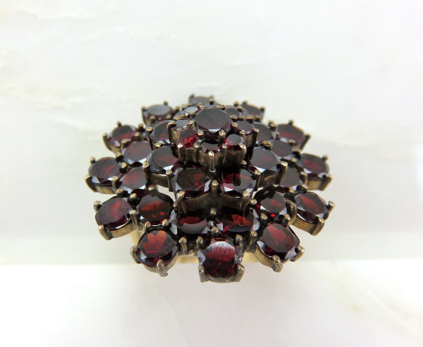 Circa 1930 Garnet Cluster ring set in 14 karat gold