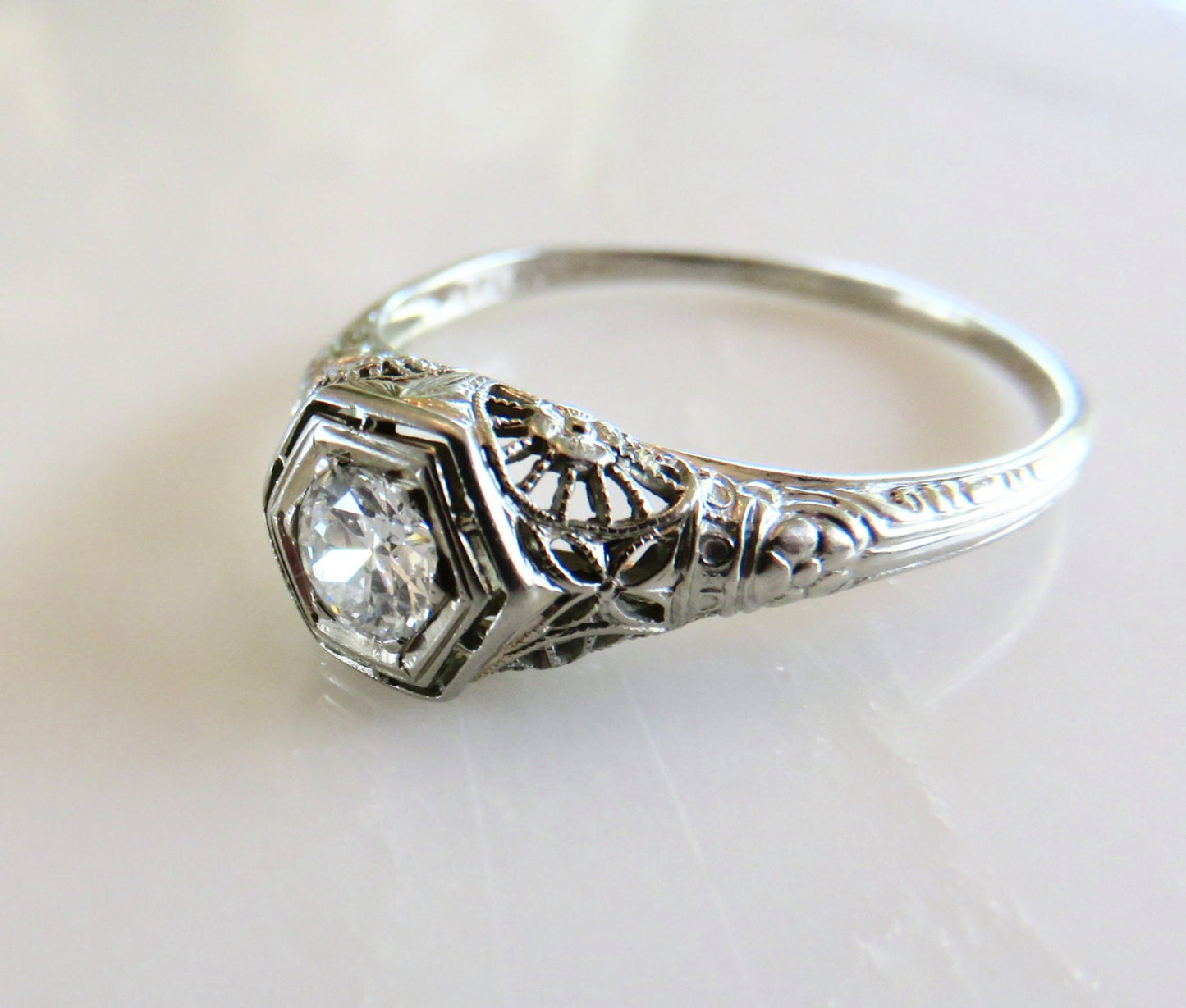 Circa 1930 18kt White Gold and Filigree 0.33 Carat VS2, G color Diamond Engagement  Ring.