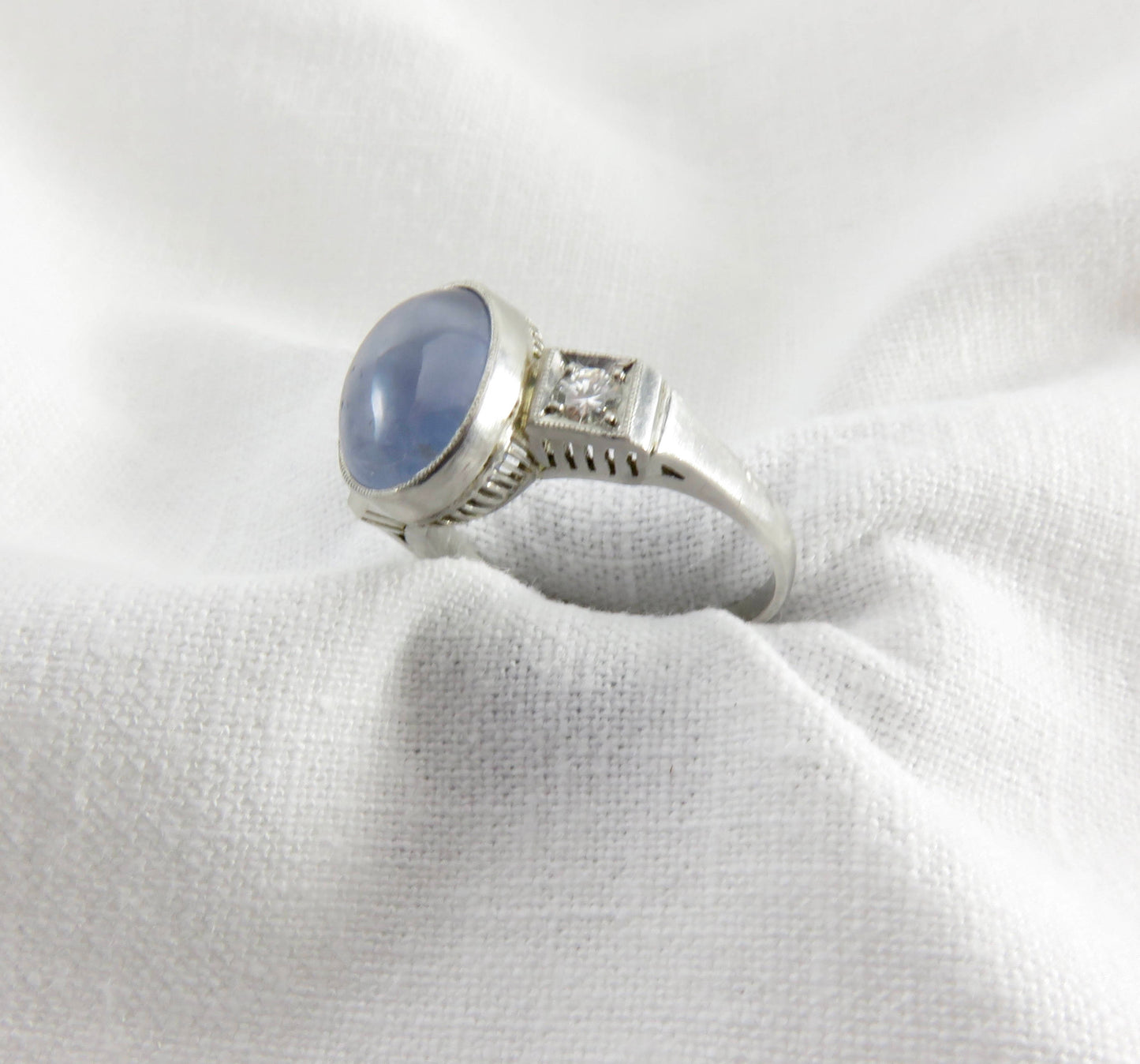 Circa 1950 6.00 Carat Star Sapphire and Diamond Ring