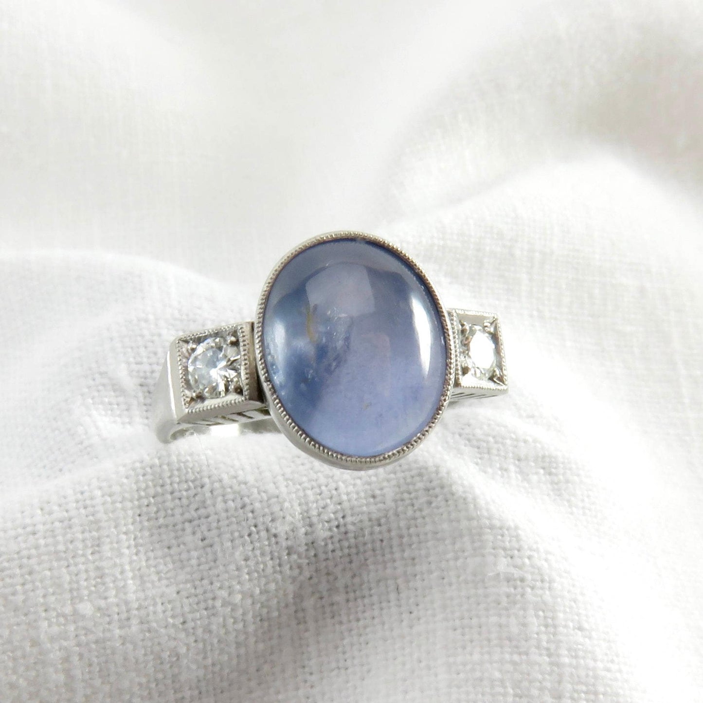 Circa 1950 6.00 Carat Star Sapphire and Diamond Ring