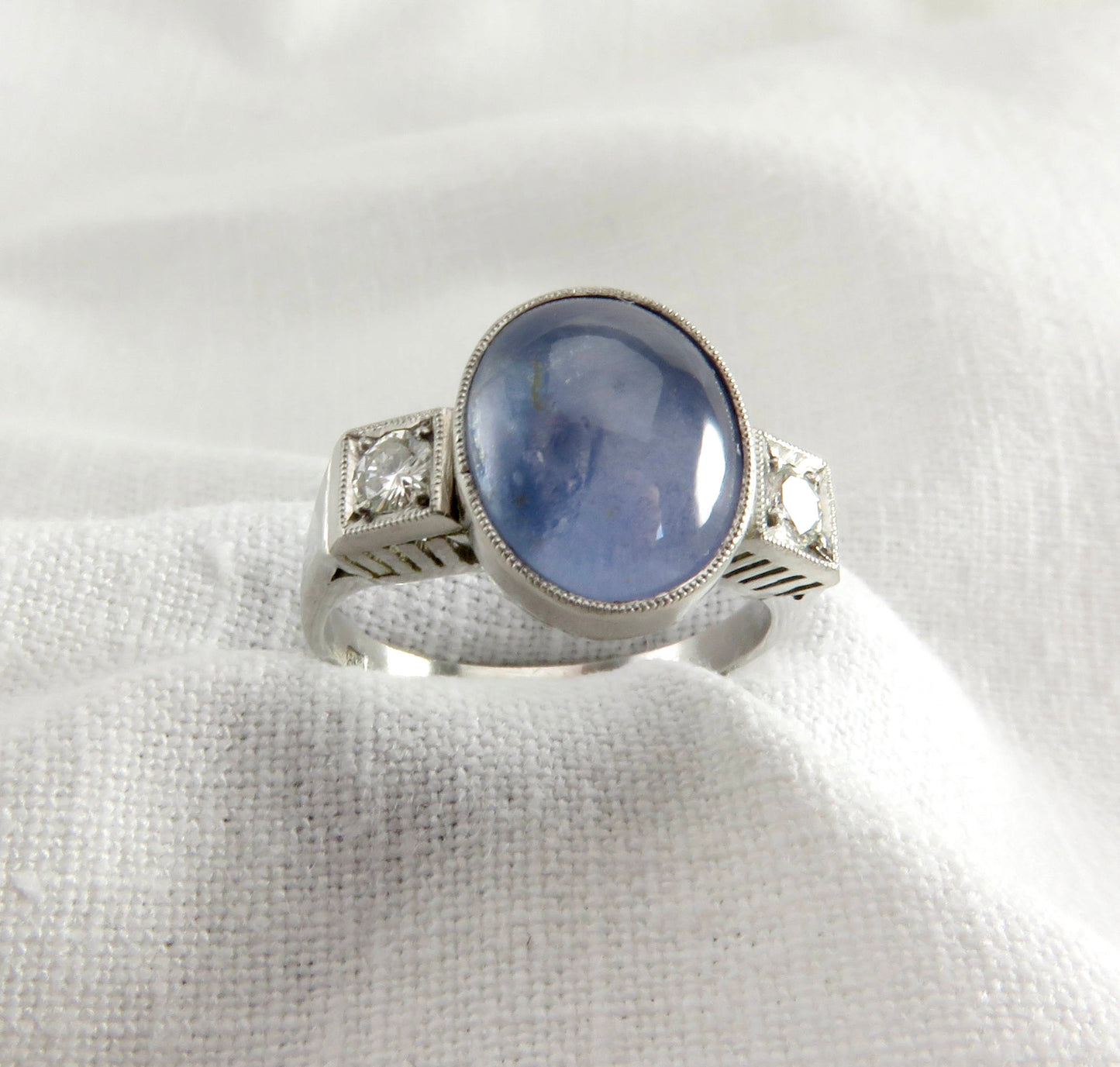 Circa 1950 6.00 Carat Star Sapphire and Diamond Ring