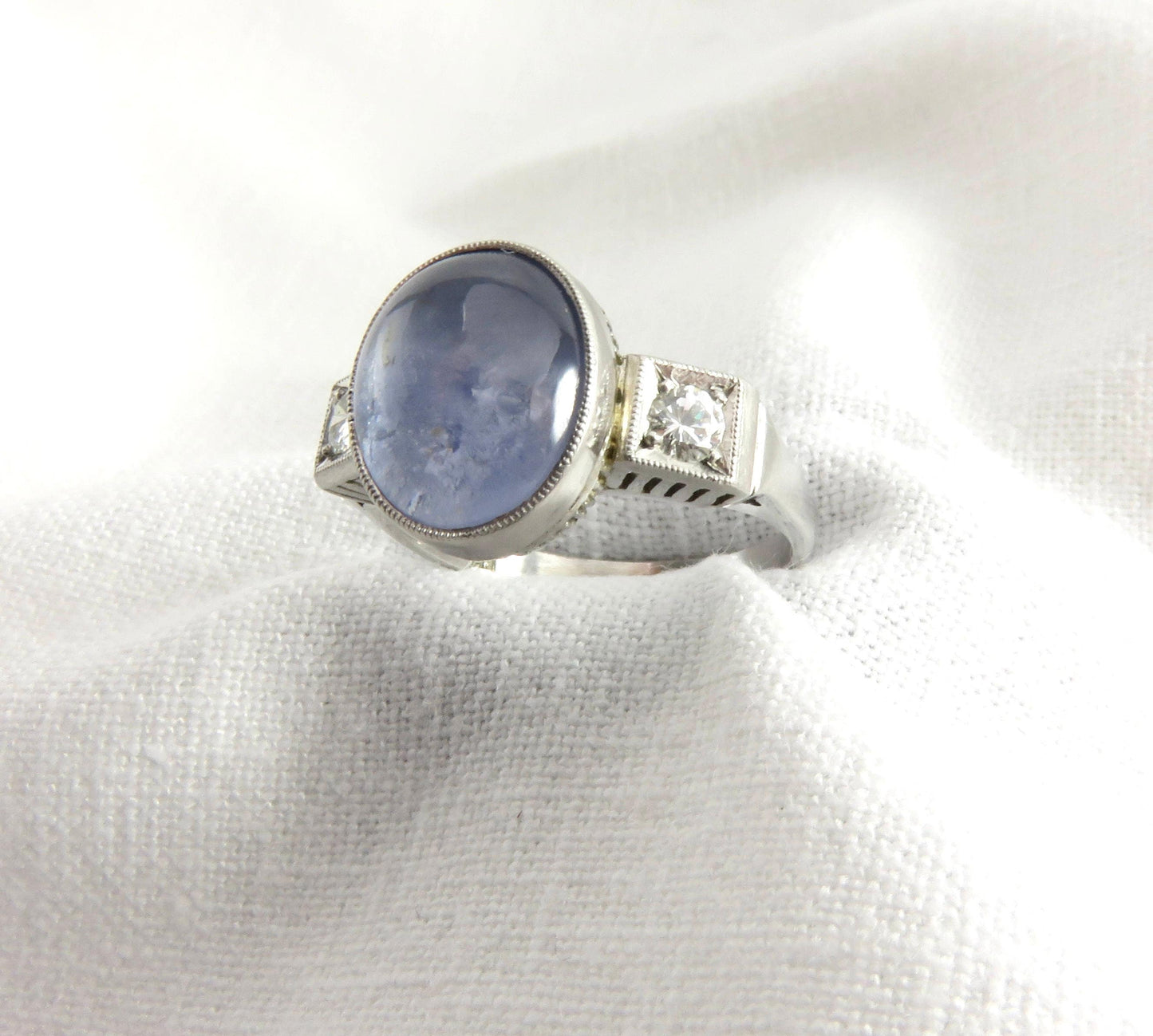 Circa 1950 6.00 Carat Star Sapphire and Diamond Ring