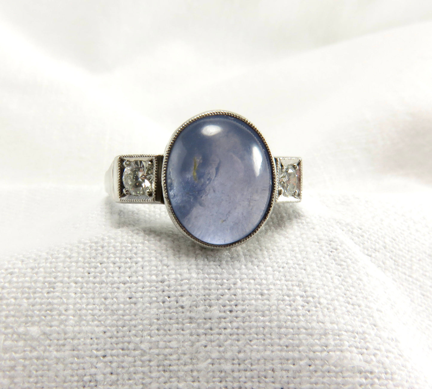 Circa 1950 6.00 Carat Star Sapphire and Diamond Ring