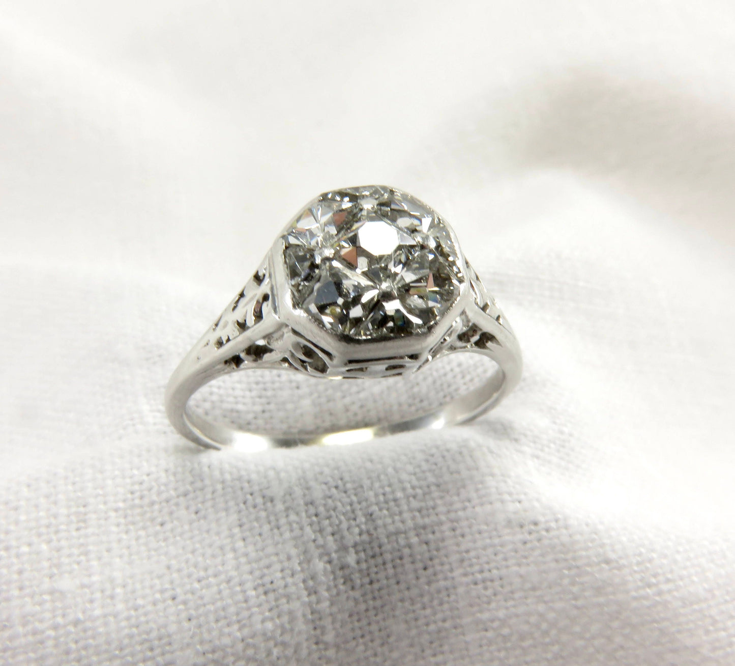 Circa 1915 Edwardian Platinum Engagement Ring with French Cut Diamonds, VS2 Clarity.