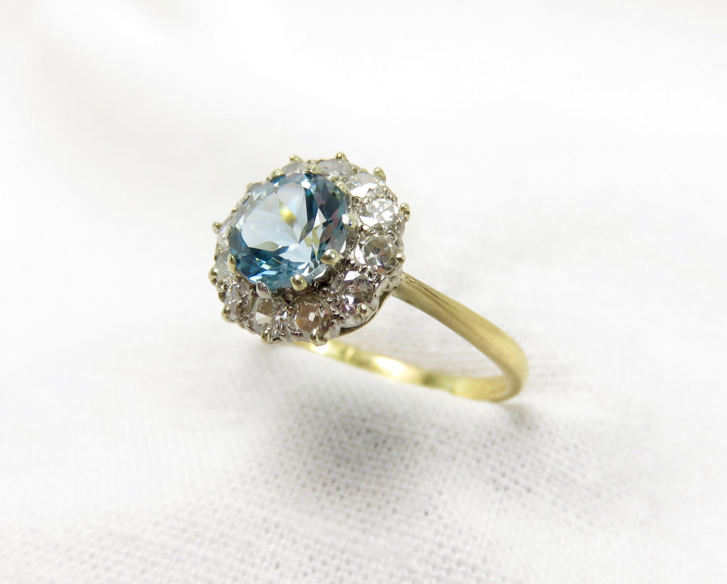 Circa 1950's  1.00 carat  Brilliant Cut  Aquamarine and Diamond Ring Set in Platinum and 18karat Gold