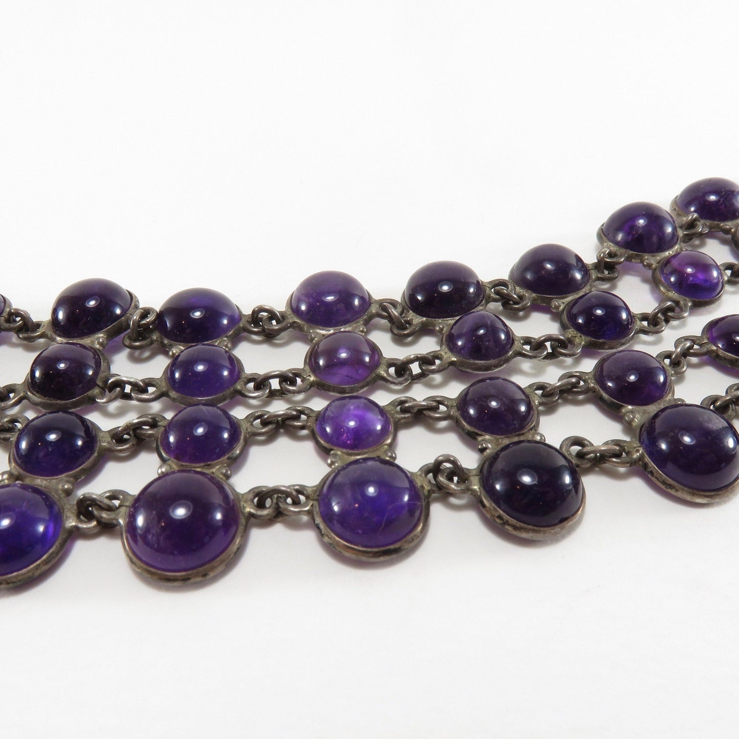 Circa 1940. Double Strand Bezel Set Cabochon Amethyst Necklace