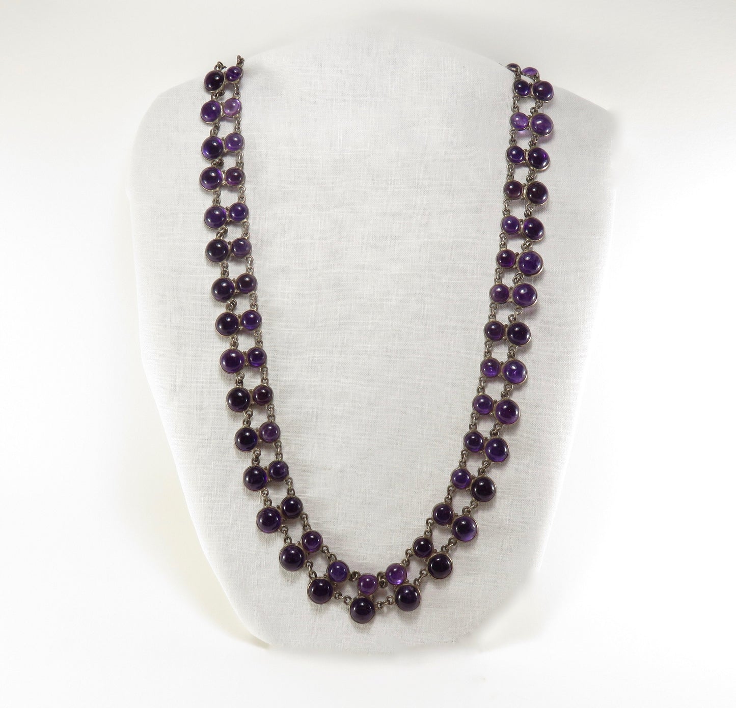 Circa 1940. Double Strand Bezel Set Cabochon Amethyst Necklace