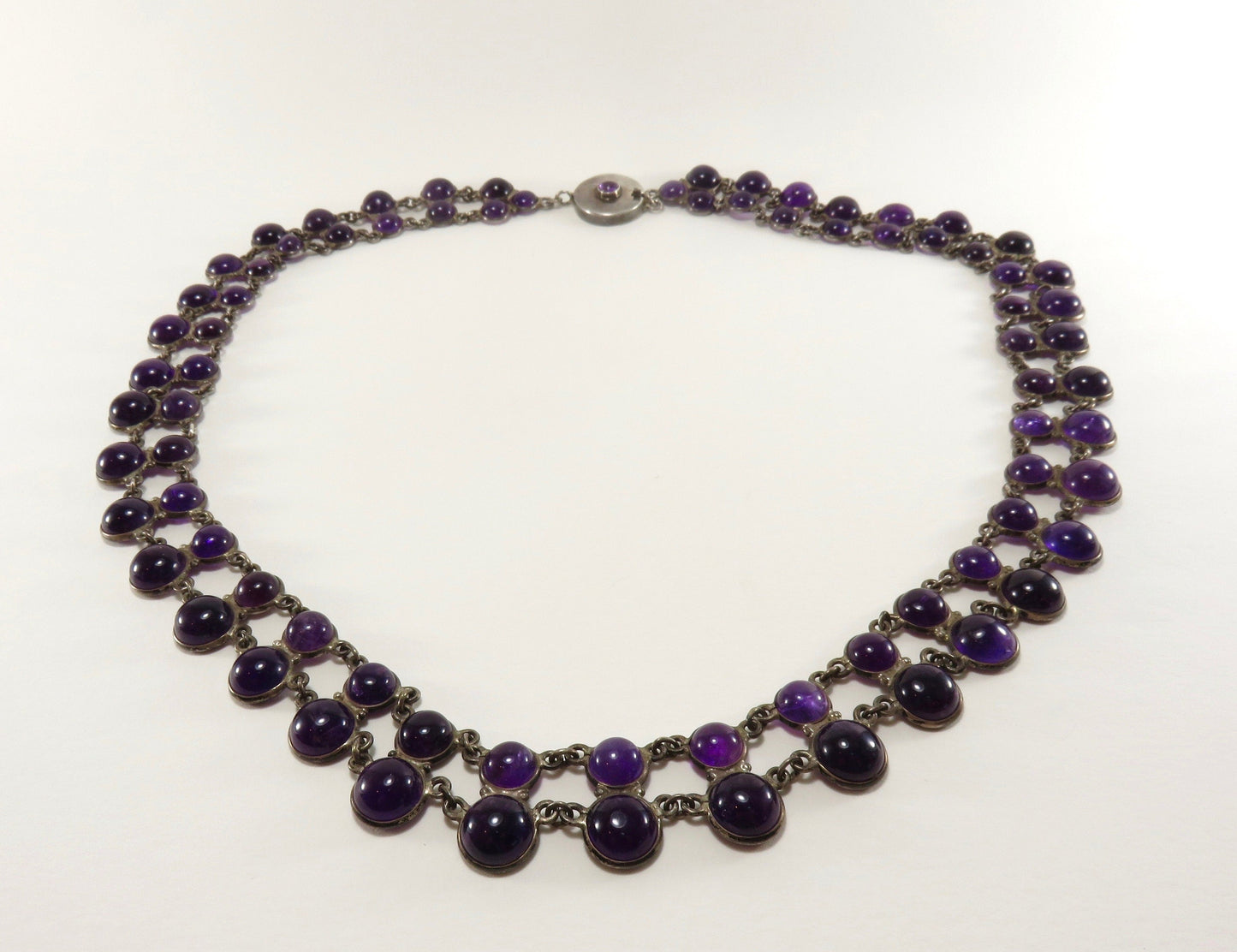 Circa 1940. Double Strand Bezel Set Cabochon Amethyst Necklace