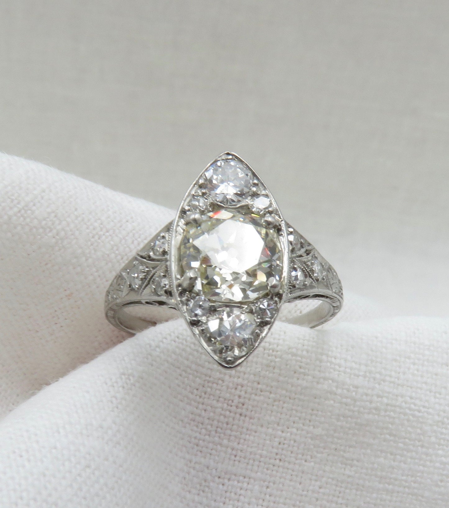 Circa 1915 Edwardian platinum and diamond ring set with GIA cert. 1.52 carat Old Mine Cut Diamond