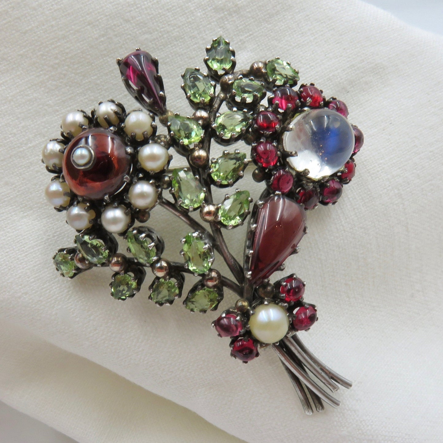 Originally 1,600.00.  Mid Century Gemstone Flower Brooch