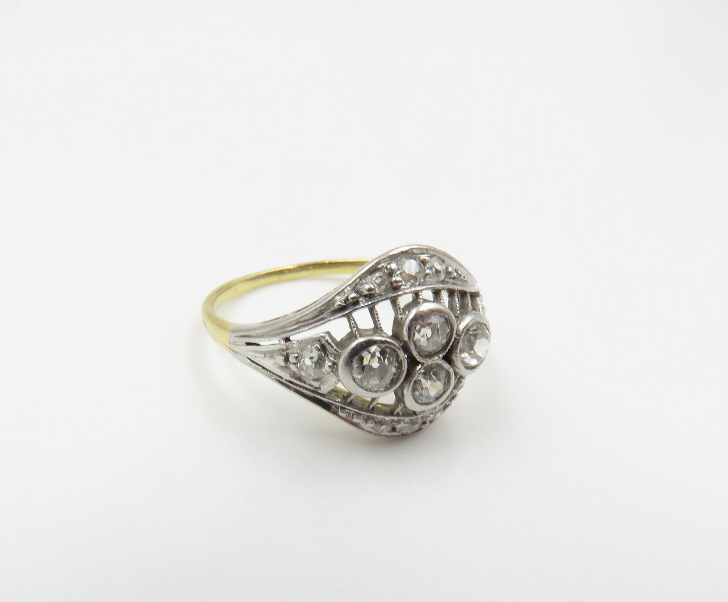 Circa 1910 18KT Gold and Platinum ring set with Old European Cut Diamonds