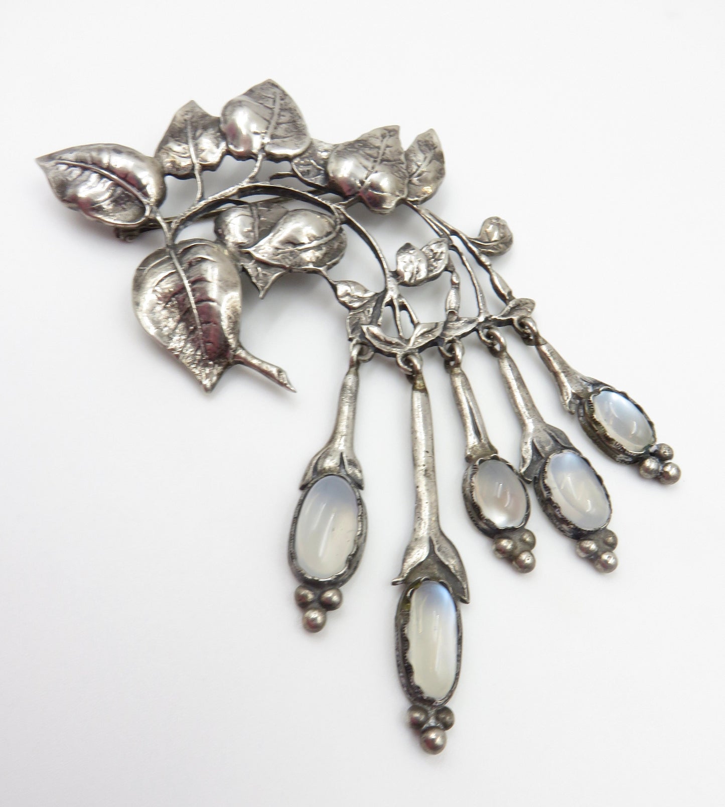 Circa 1940. Silver and Moonstone Brooch and Earring set by Cini