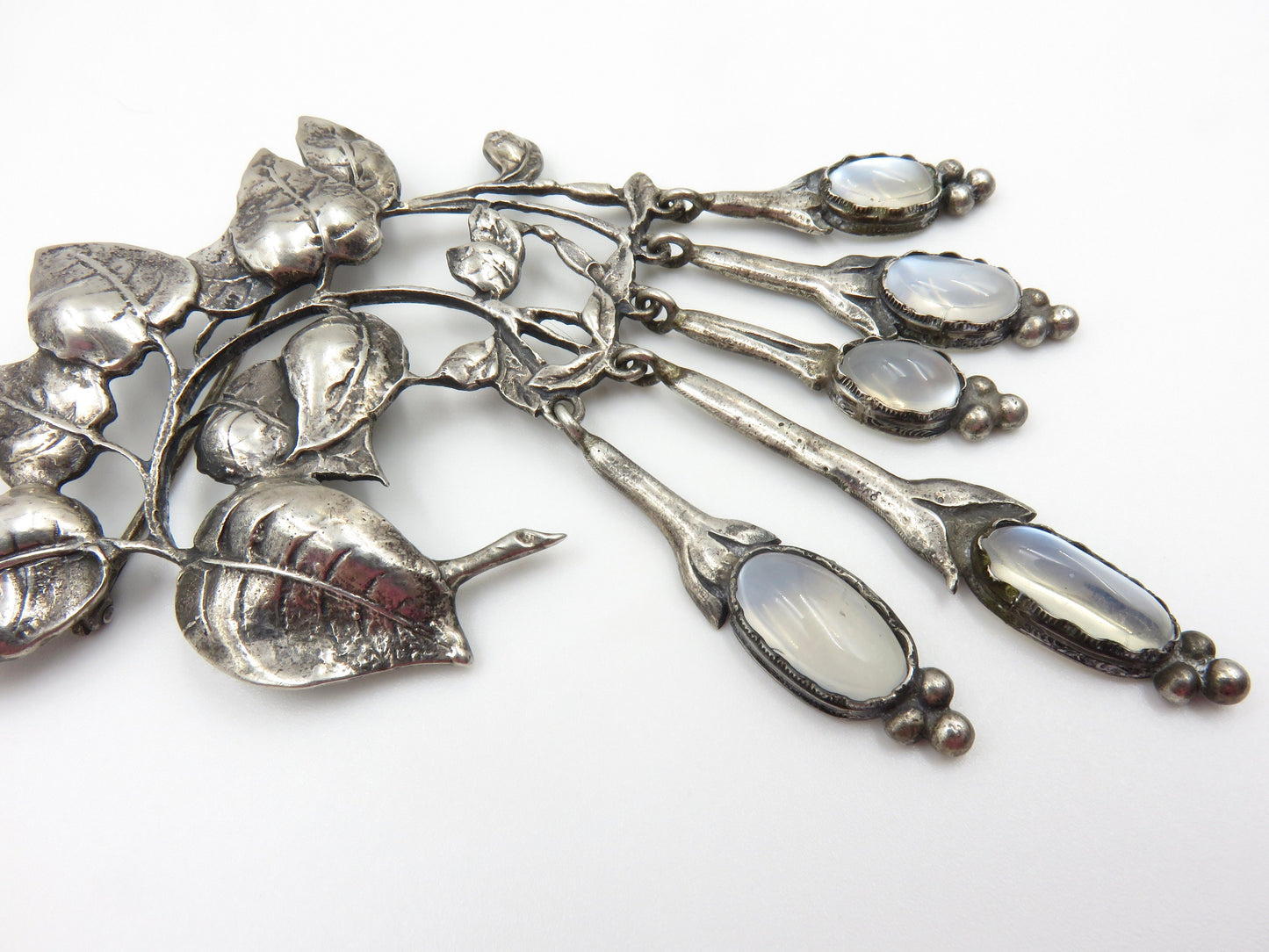 Circa 1940. Silver and Moonstone Brooch and Earring set by Cini