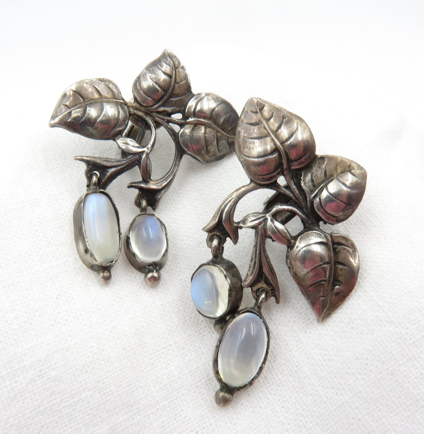 Circa 1940. Silver and Moonstone Brooch and Earring set by Cini