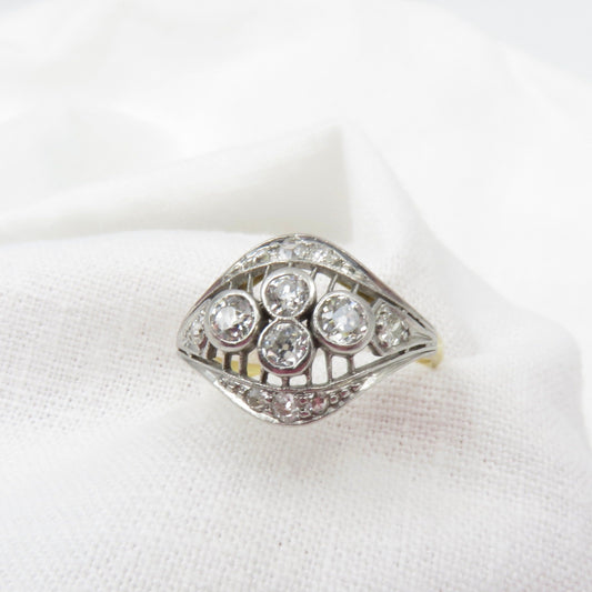 Circa 1910 18KT Gold and Platinum ring set with Old European Cut Diamonds