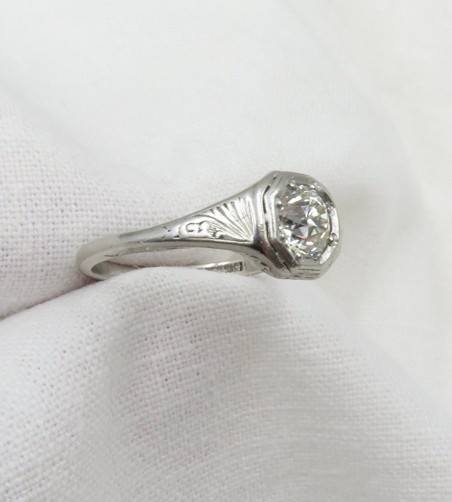 Circa 1920's Platinum Engagement Ring set with 0.83 CT VS1 Old European Cut Diamond